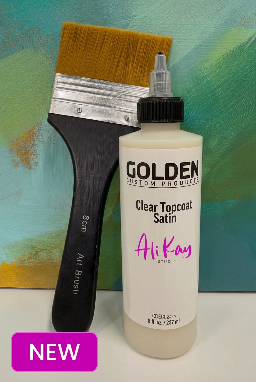 Topcoat and brush photo with matching magenta NEW sticker at bottom left